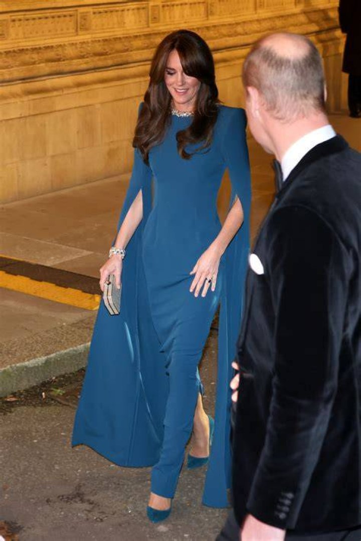 Kate accessorises her dresses and coats with thin belts.