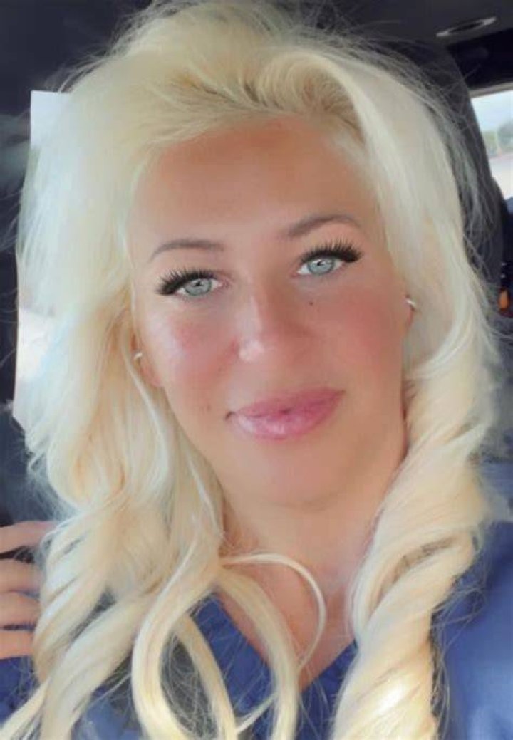 Katie Baunach had gone to her estranged husband's home to retrieve her belongings, cops said