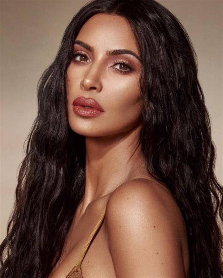 Kim Kardashian - April 7 (peach jumper)