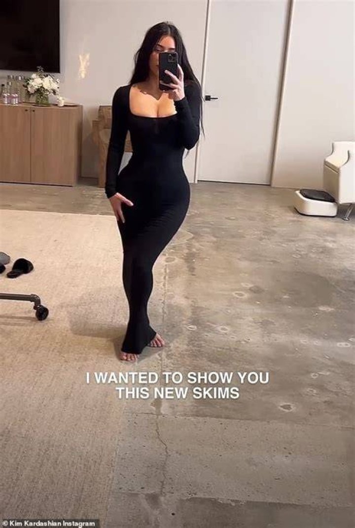 Kim Kardashian has rolled around on the grass for some new photos