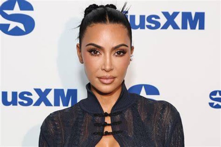 Kim Kardashian (pictured) stunned in her all-black outfit at Jay-Z's pre-Grammys party