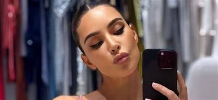 Kim posted a snap of her own showing her kissing her man at the birthday dinner