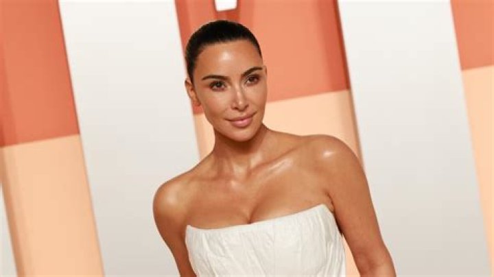 Kim went for a more muted version of Gaga's head-to-toe houndstooth ensemble