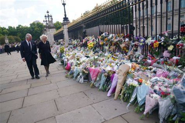 King Charles appeared sombre as he followed his mother in Westminster Abbey