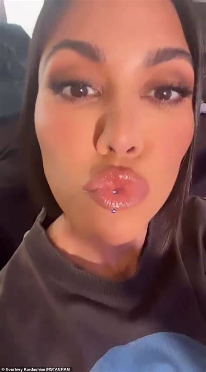 Kourtney donned herself 'Barbie Barker' as she sported lingerie, heels, and dyed blonde hair