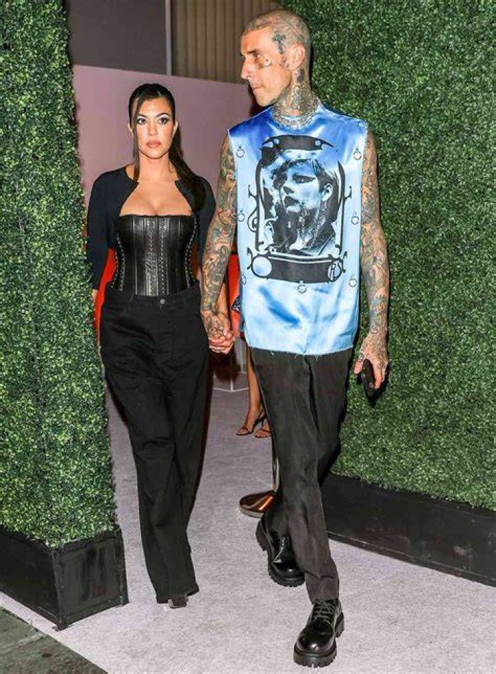 Kourtney was seen in a causal outfit featuring a tattered black shirt