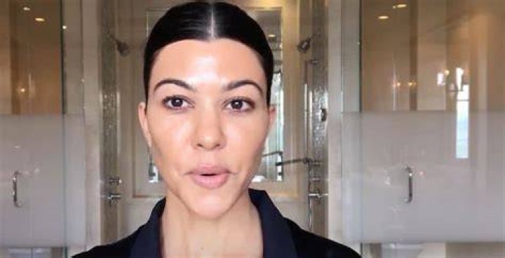 Kourtney was waiting at the finish line for her husband