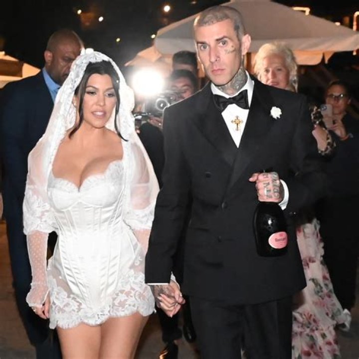 Kourtney wore white for her ceremony Sunday, but nearly every other Kardashian wore black