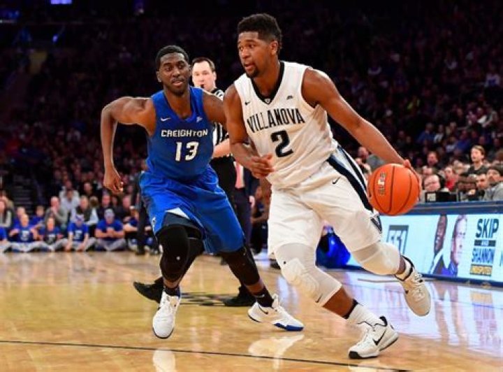 Kris Jenkins #2 of the Villanova Wildcats puts up the game-winning three-point shot as time expires against the North Carolina Tar Heels during the 2016 NCAA Men's Final Four Championship at NRG Stadium on April 04, 2016 in Houston, Texas.