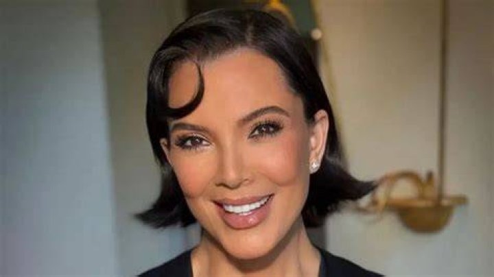Kris Jenner gave the titular Grinch from the Grinch musical a kiss in her new snaps
