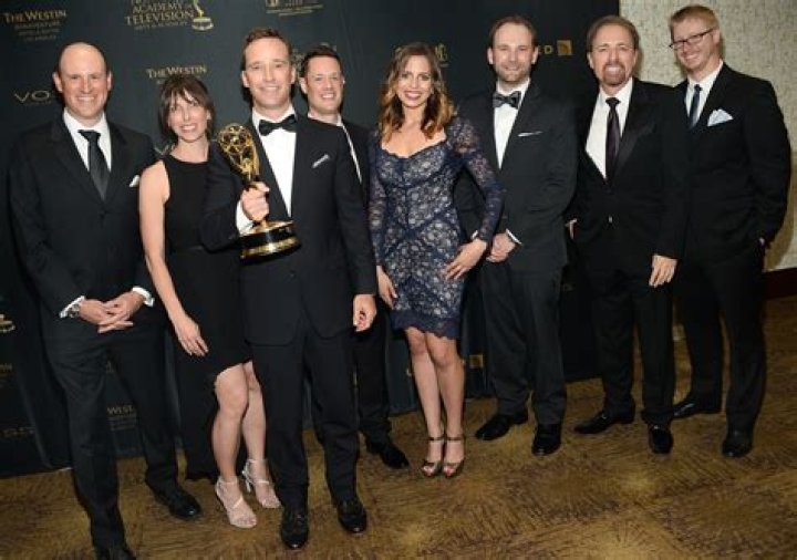 (L-R) Adam Sandler, Evelyn Warfel, Mike Richards, Eric Mills, Heather Allen, Chris Donnan, Stan Blits, and Trevor Rogas of The Price is Right