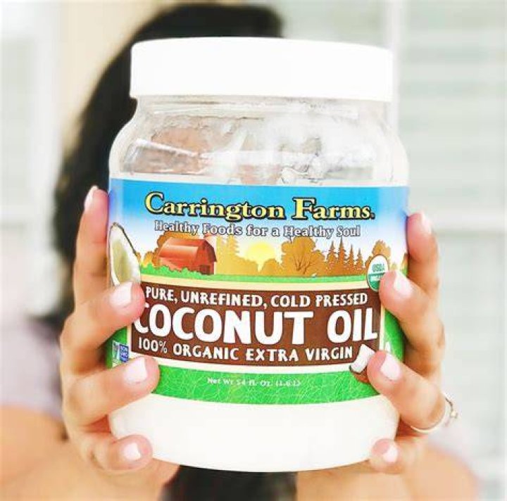 Lauren warmed coconut oil in a glass before adding two other oils