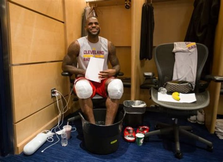 LeBron James soaks his feet after a basketball match when he was playing for the Cleveland Cavaliers