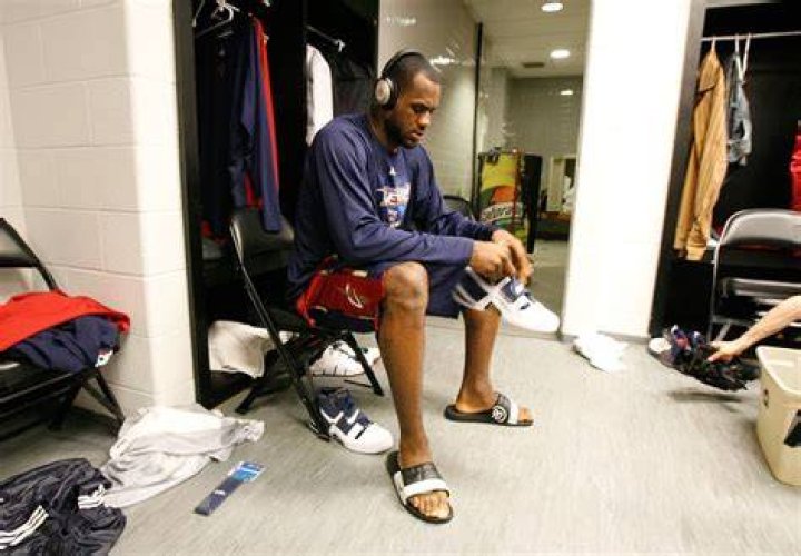 LeBron often wears sliders in the locker room before and after basketball games (seen here in 2007)