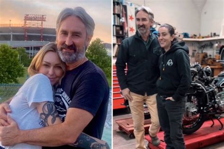 Leticia and Mike visited Boston recently, smiling in front of Fenway Park