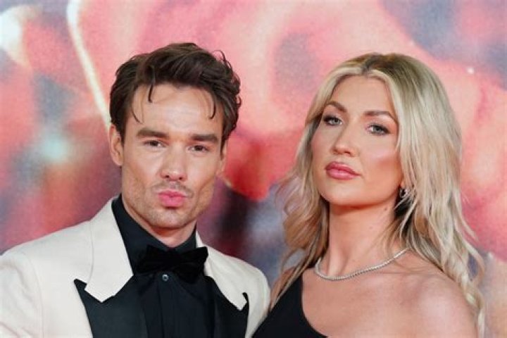 Liam playfully pouted for the cameras