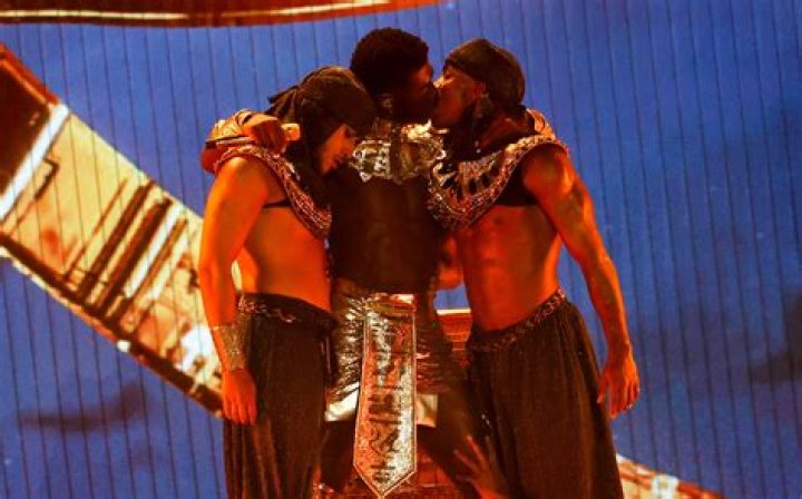 Lil Nas X kisses one of the dancers as he performed during the BET Awards in 2021