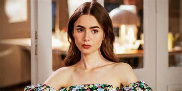 Lily Collins as Emily Cooper