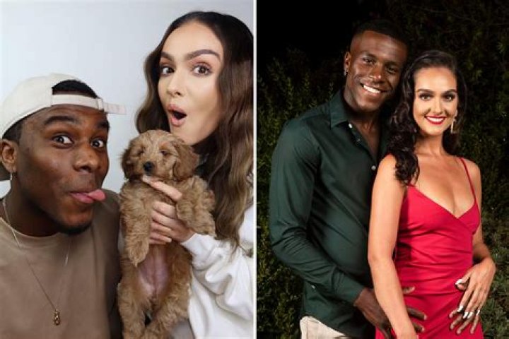 Luke T and Siannise pose with their new puppy Nala &ndash; as they take their relationship to the next level