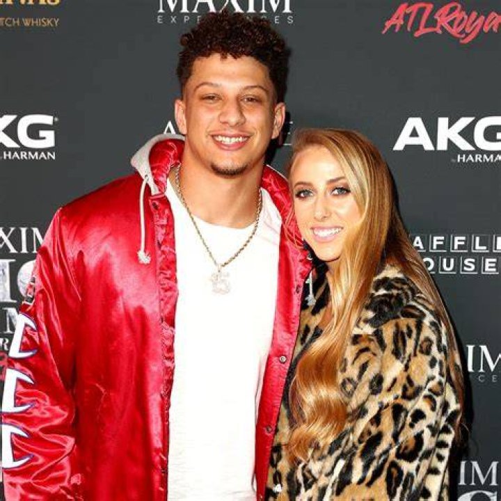 Mahomes and his fiancee after his Super Bowl win in Miami last year