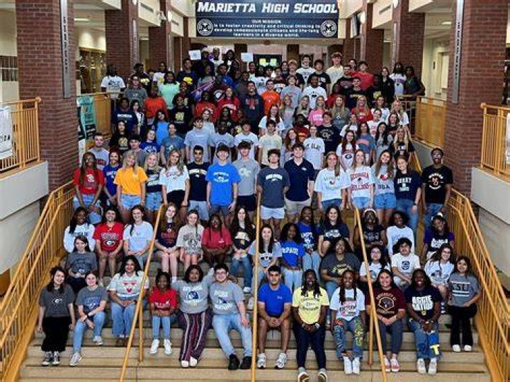 Marietta High School students gathered the day after her death to transform what was once her parking spot into a tribute to her life