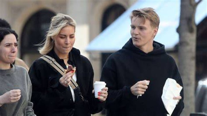 Martin Odegaard and Helene Spilling lined up for a football match in Norway
