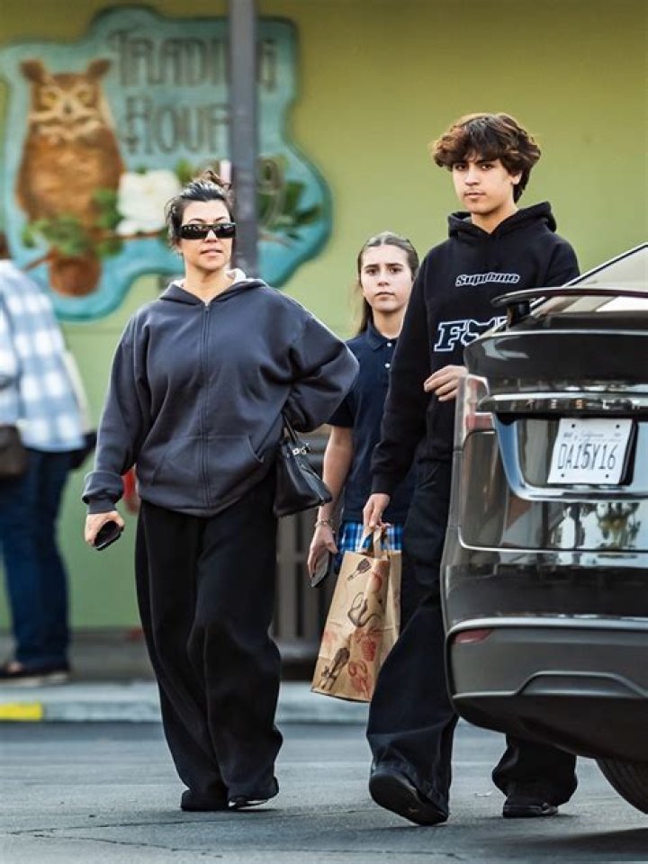 Mason, Penelope, Kourtney, Scott, and Reign pictured together