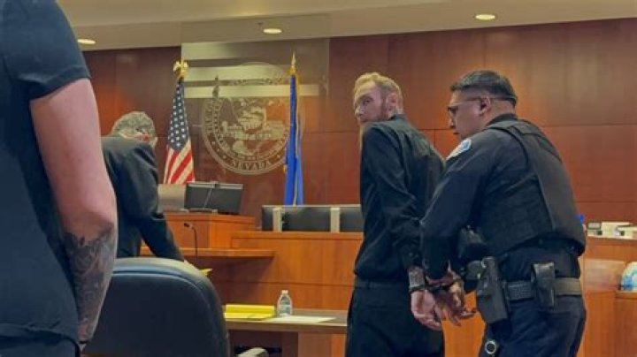 McDougal is taken into custody on Friday in an unrelated aggravated assault case