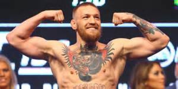 McGregor uploaded a picture of a weight bench, stacked up for a massive press
