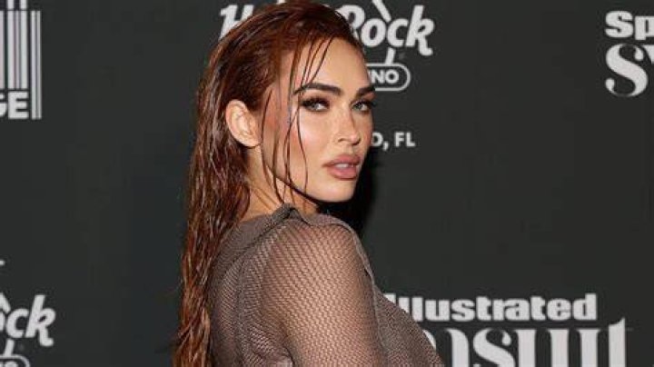 Megan Fox looked racy in a strapless red number with her partner Machine Gun Kelly