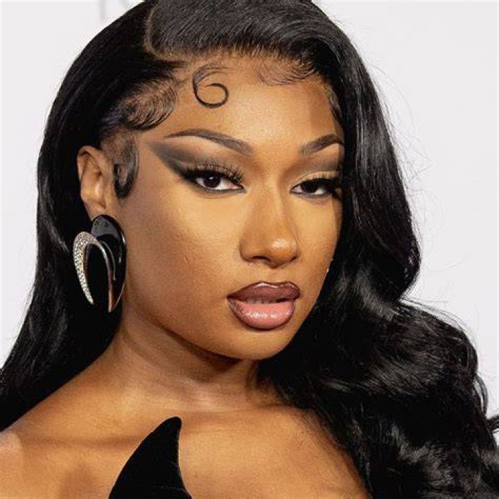 Megan Thee Stallion stunned in a strapless light pink Coach dress with layers of tulle