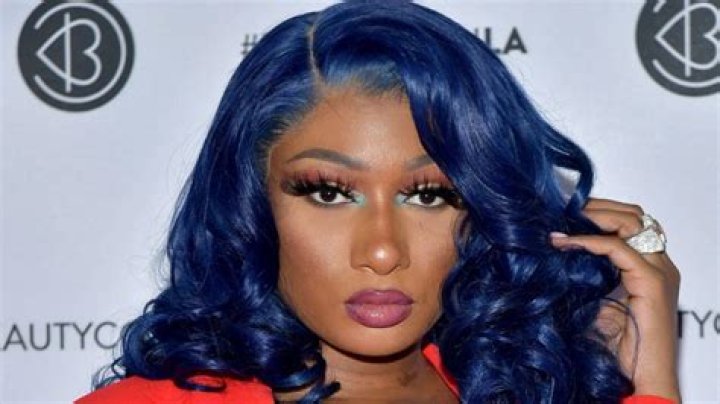 Megan Thee Stallion suffered a wardrobe malfunction in a see-through nude dress as she strolled into Chateau Marmon in Los Angeles