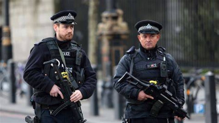 Met Police officers at the scene of the shooting last night