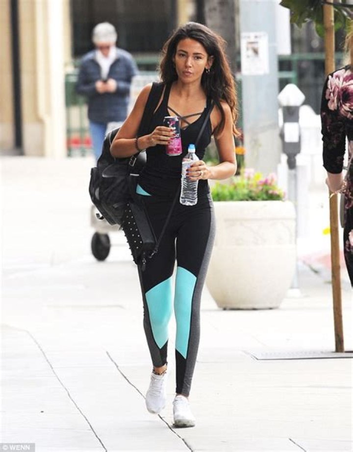 Michelle wore leggings and tacky gold jewellery for the leaving do in 2014, and was pictured with husband Mark
