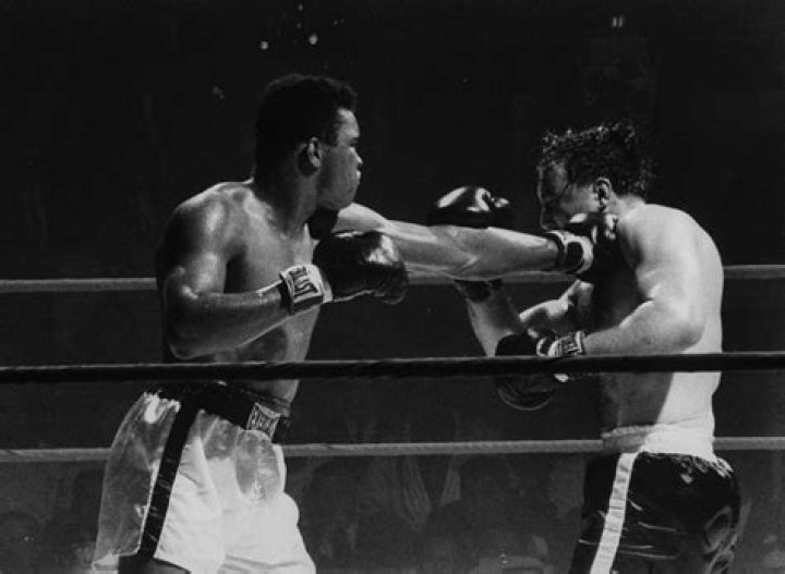 Muhammad Ali Junior fighting in the 1970s and being introduced to the crowd by his famous father