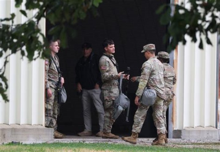 National Guard stand guard after a vehicle rammed a barricade at the US Capitol