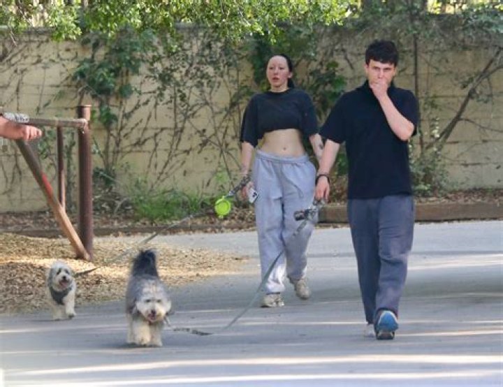 Noah and Pinkus walk their dogs