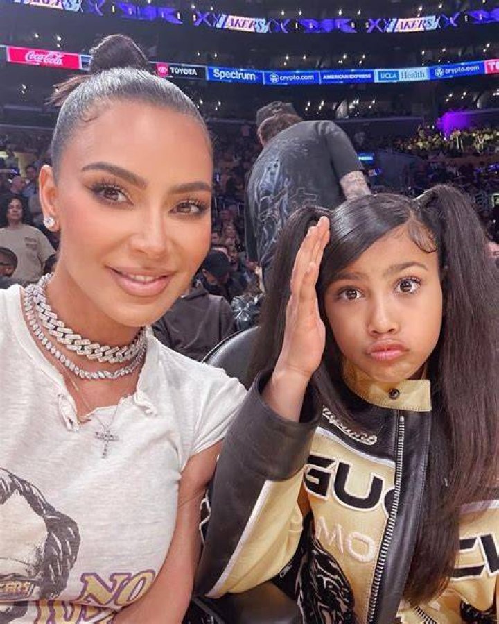 North took this sexy photo of her famous mom on an escalator