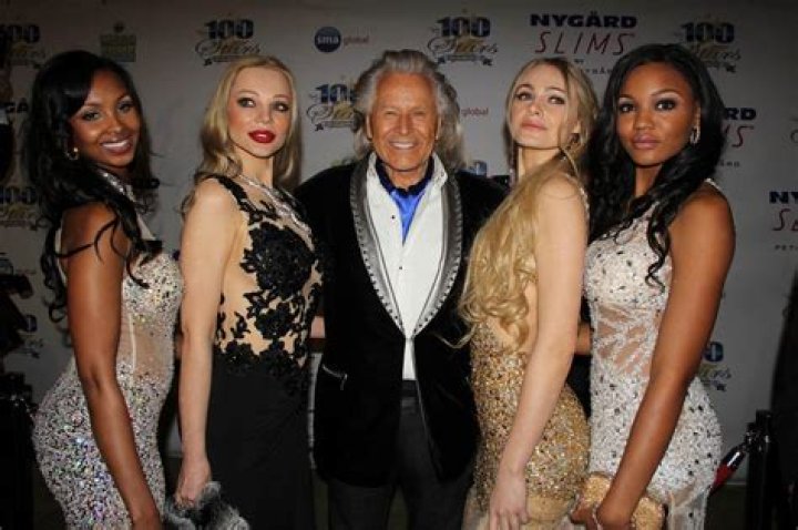 Nygard with models at a fashion show in Helsinki, Finland in 1994