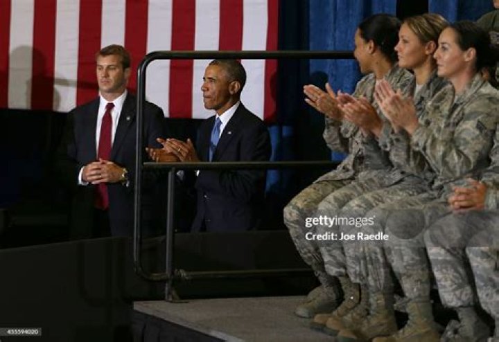 Obama arrives to speak at a rally as he campaigns for Joe Biden
