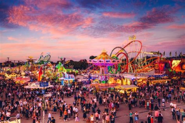 Oktoberfest contains fair rides, beer tents, and plenty of chicken for festival-goers to enjoy