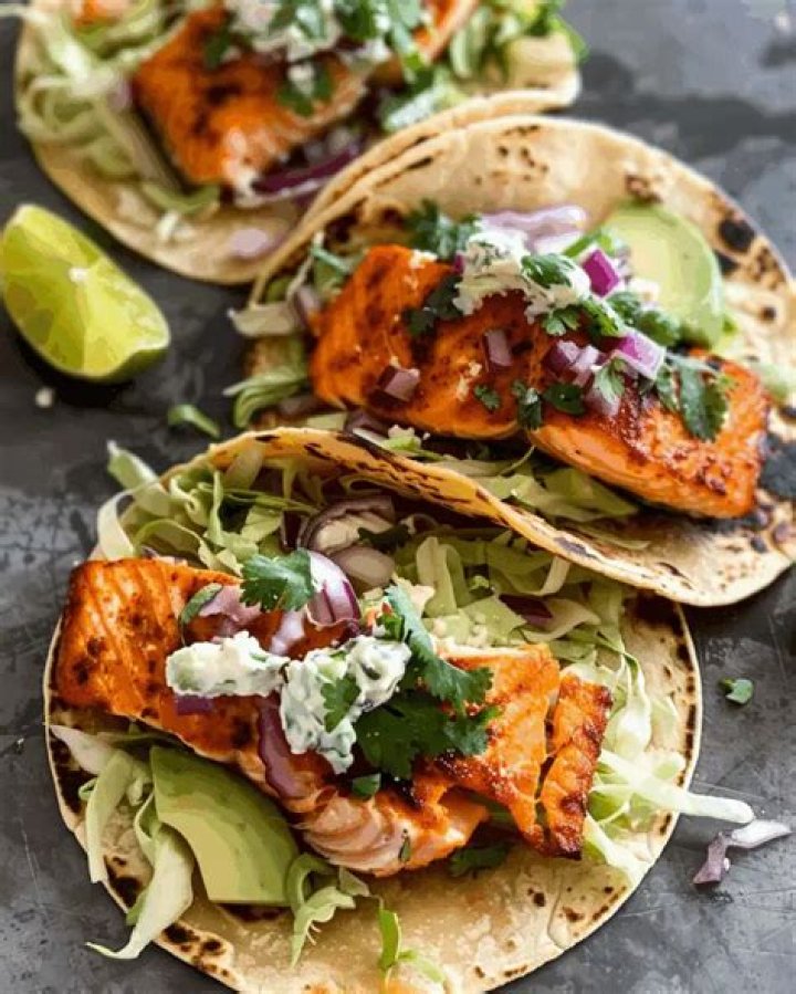 Options include tacos, salmon, steak, pasta, and more along with a whole list of specialty cocktails priced at $12 for three