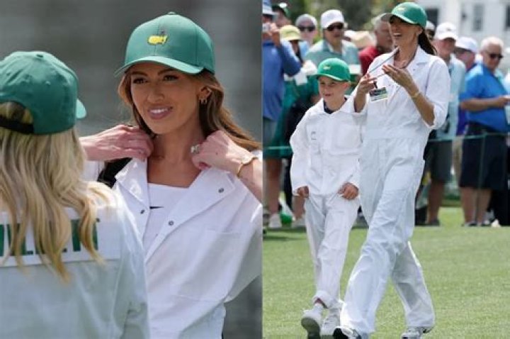 Paulina Gretzky turned caddy for her husband at the Masters on Wednesday