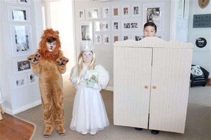 Peagan dressed her other kids, Cade, as the lion and Stella as the witch 