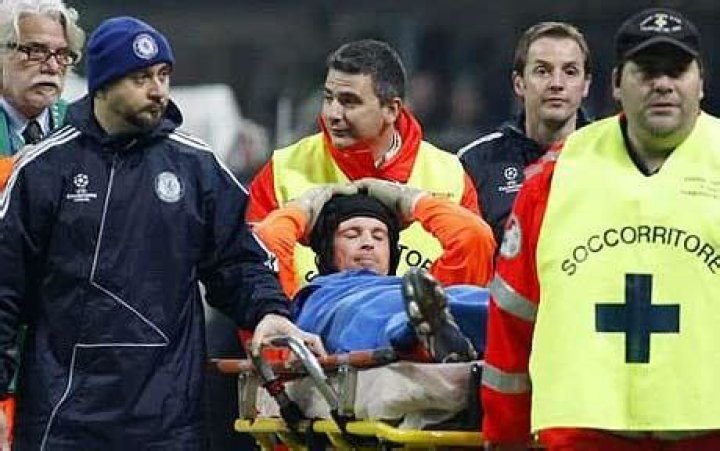  Petr Cech is carried off on a stretcher after fracturing his skull