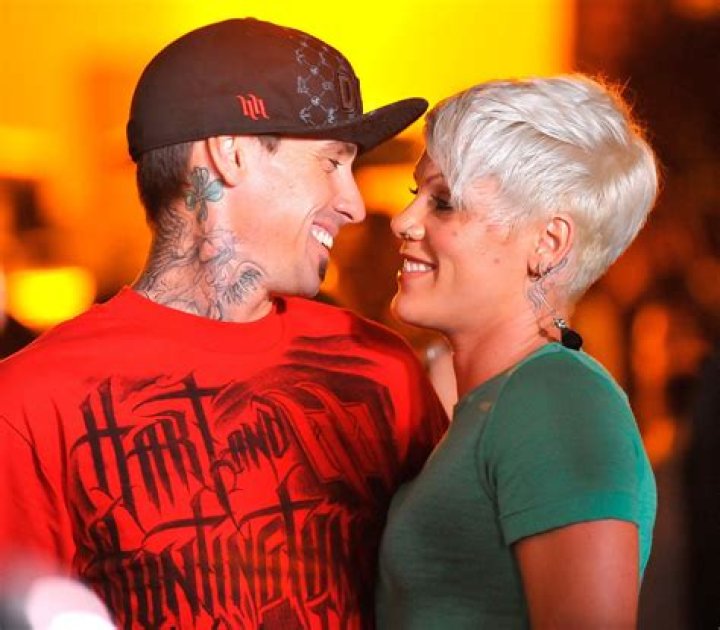 Pink and Carey Hart New Music Video Yellow Bath Robe With Flowers On Phone Drinking Coffee