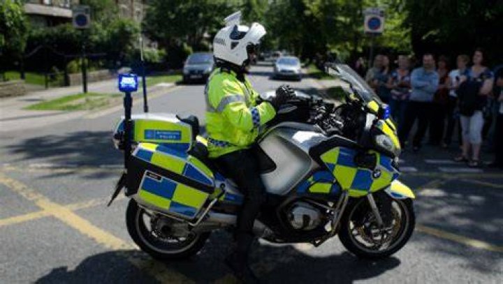 Police used their bikes to form a blockade between protesters and the building
