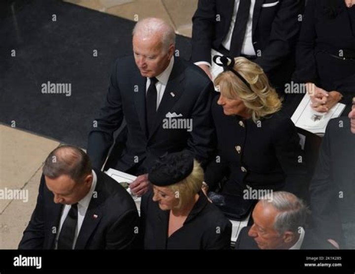 President Joe Biden is accompanied by First Lady Jill Biden as he blows his whistle for the beginning of a race during the White House Easter Egg Roll on April 18, 2022