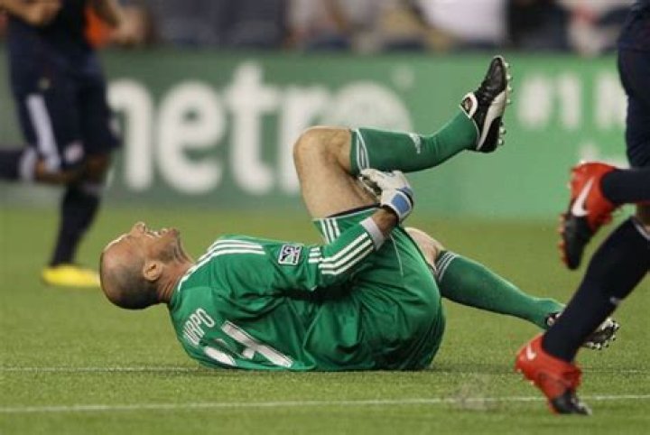  Preston Burpo lies in agony with the goalkeeper's career over