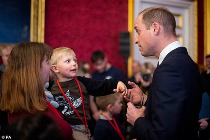 Prince William laughs with James after Pippa's wedding in 2017